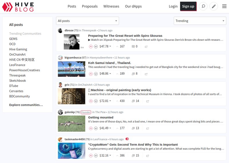 A screenshot of the Hive Blog website showing trending posts, user names, and brief excerpts of blog entries with dates and number of likes and comments, showcasing one of the best decentralized social media networks.